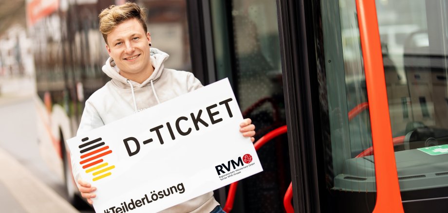 Man on bus with Germany ticket
