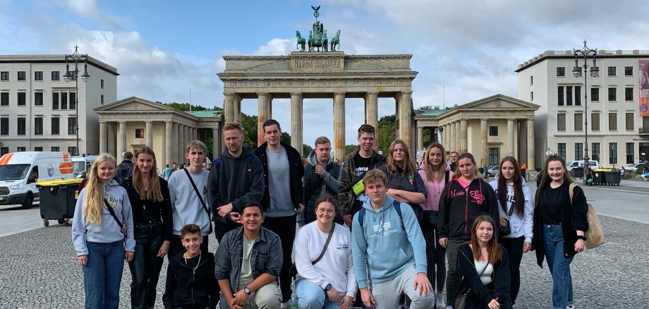Group photo in front of the Brandenburg Gate