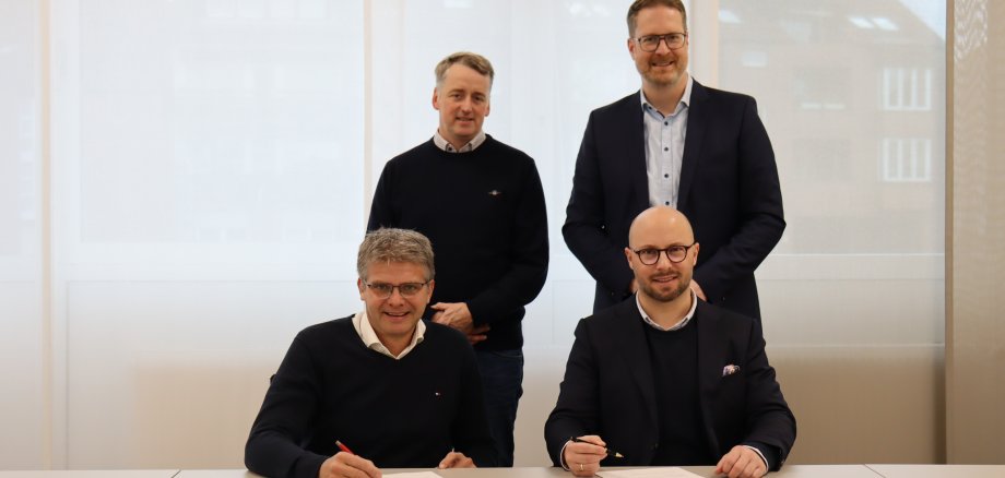 Group photo at the signing of the contract